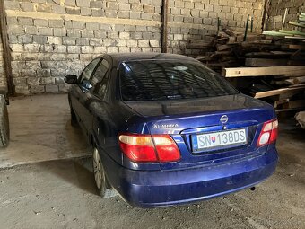 Nissan Almera N16 sedan - 3