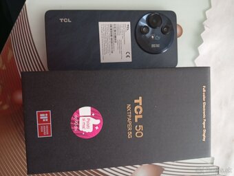 Predám mobilný telefón TCL - 3