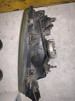 Predny svetlomet nissan almera 1,4l - 3