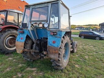 6911 - 3