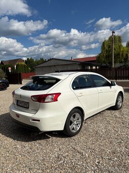 Mitsubishi Lancer 1,5 - 3