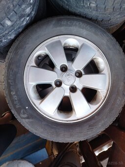 Predám letnú sadu pneu s diskami 185/65 r 14 orig. kia rio - 3