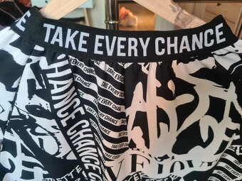 Vzorovaná midi sukňa - 3