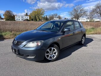 Mazda 3 1.4i - 3