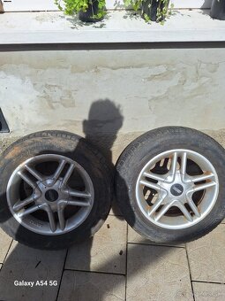Predám 4ks elektrónov z Kia Rio 2 - 185/65 R14 - 3