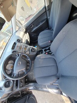 Kia carens - 3