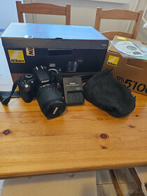 Nikon D5100 + 18-55 AF-S DX VR - 3