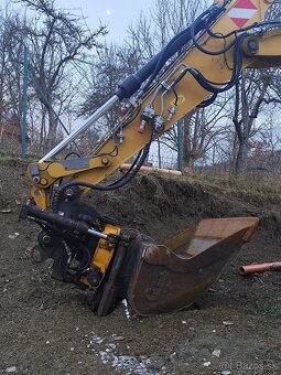 Caterpillar M313D kolesový bager - 3