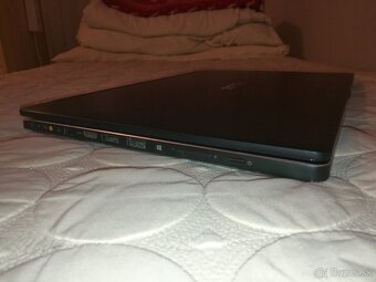 Asus. (2-v-1) konvertibilný notebook s dotykovým displejom. - 3