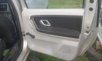 Skoda Roomster-Tapacire dveri - 3