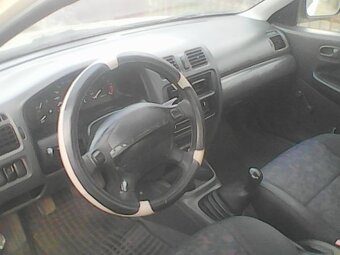 Mazda 323 1,5 benzin 65 KW - 3
