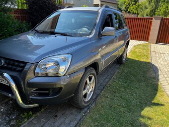 Sportage 2,0i ,4x4 - 3