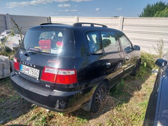 Kia carens crdi - 3