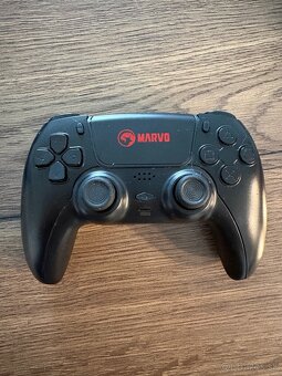 PlayStation 4 Slim - 3