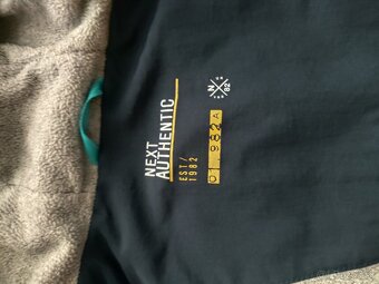 Prechodná vetrovka Next 122 - 3