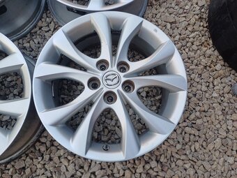 hlinikové disky org.Mazda 3,---7Jx17-ET-52,5---5x114,3 - 3