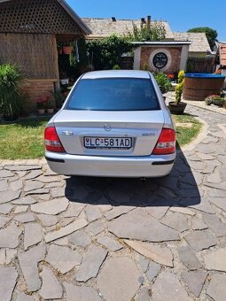 Mazda 323 1,5 benzín 65kw - 3