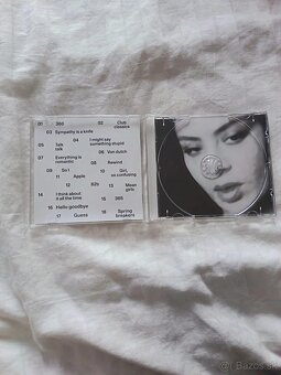 brat and it's the same but there's three more songs... - 3