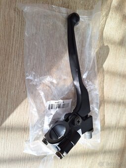 Brzdová páčka spojky držiakom. - 3