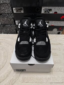 Air Jordan 4 Retro - White Thunder - 3