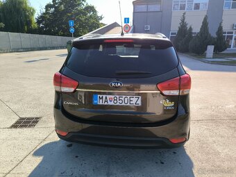 Kia carens - 3