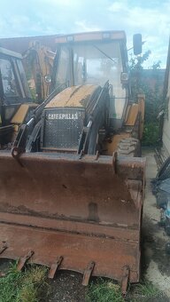 Cat 428C - 3