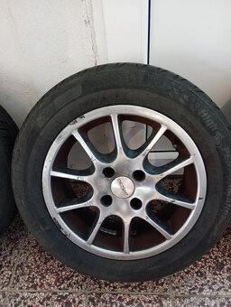 Sada letných pneumatík s alu diskami 185/65 R15 4x108 - 3