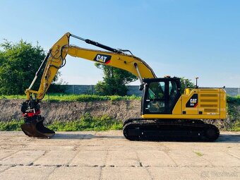 Pásový bager Caterpillar 323 - 3