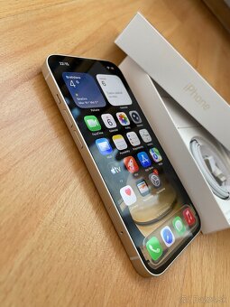 📱 iPhone 14 128 GB – Starlight - 3