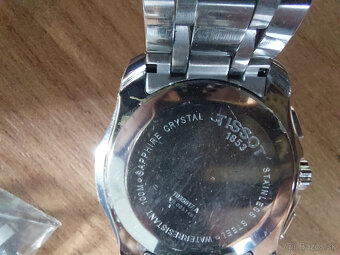 Tissot T035817A - nefunkčný - 3