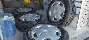 Disky kompletne + letné obutie + puklice original Ford. - 3