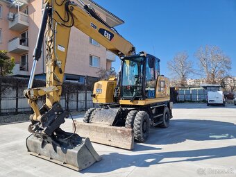 Kolesové rýpadlo CAT 316F - 3
