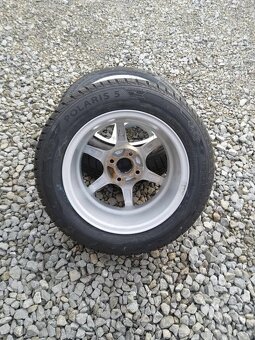 14" alu 4 x 100 + nové zimné 175/65 14. - 3