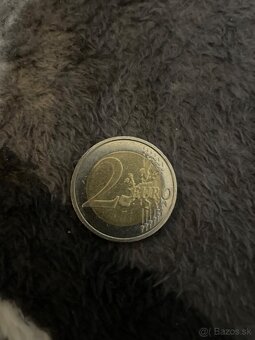 2€ - 3