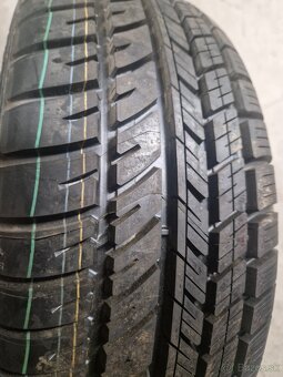 Rezervy Ford - nepoužité - 2x R15 a 1x R14 - 3