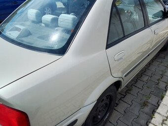 Mazda 323f-bj - 3