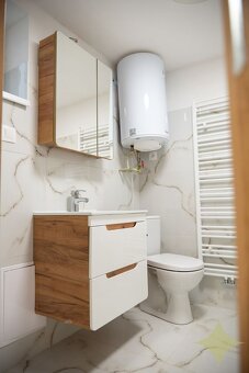 Na prenájom 1-izbový mezonetový byt so záhradkou a vlastným - 3