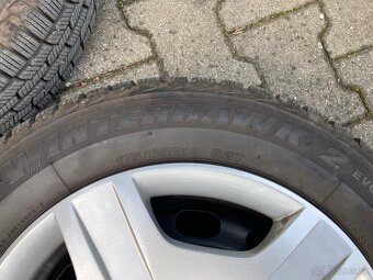 Predám sadu zimných kolies s puklicami na Ford Fiesta R14 - 3