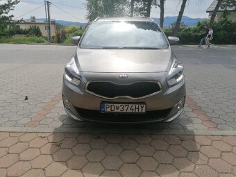Kia carens - 3