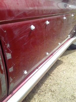 Plastové úchytky na Suzuki. - 3