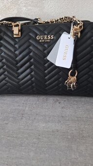 Guess - 3