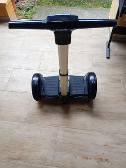 Hoverboard s tyčou - 3
