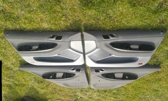 Tapacíry,rohož kufra,puklice a iné diely-Škoda Fabia1 - 3