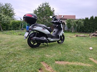 Sym citycom s300i - 3