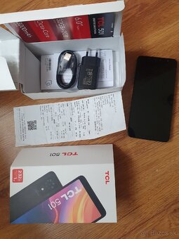 Mobil TCL 501 - 3