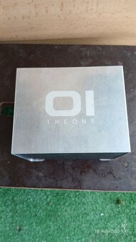 Hodiny OI theone - 3