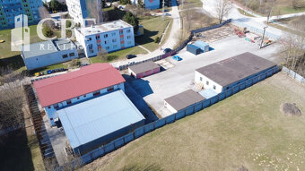 Na predaj priemyselný areál s admin. budovou a garážami v Ro - 3