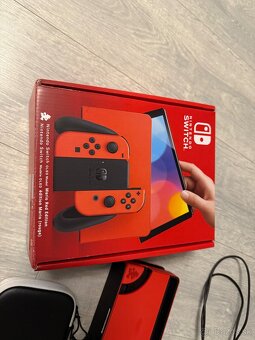 Nintendo Switch Oled Mario Red Edition + Ring Fit Adventure - 3