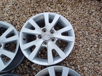Orig.hlinikove disky Mazda - 3,5,6-6 1/2Jx16-ET-52,5-5x114,3 - 3