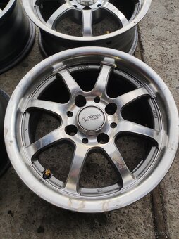 Elektróny Kyova racing r14 - 3